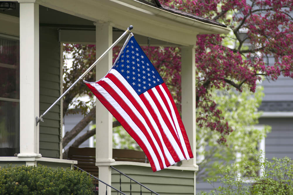 American flag on the porch.